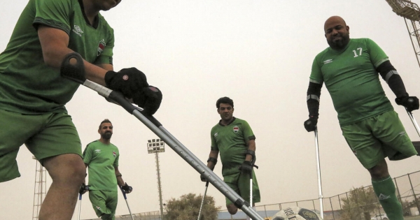 Iraqi youth discouraged by violence form football team for amputees